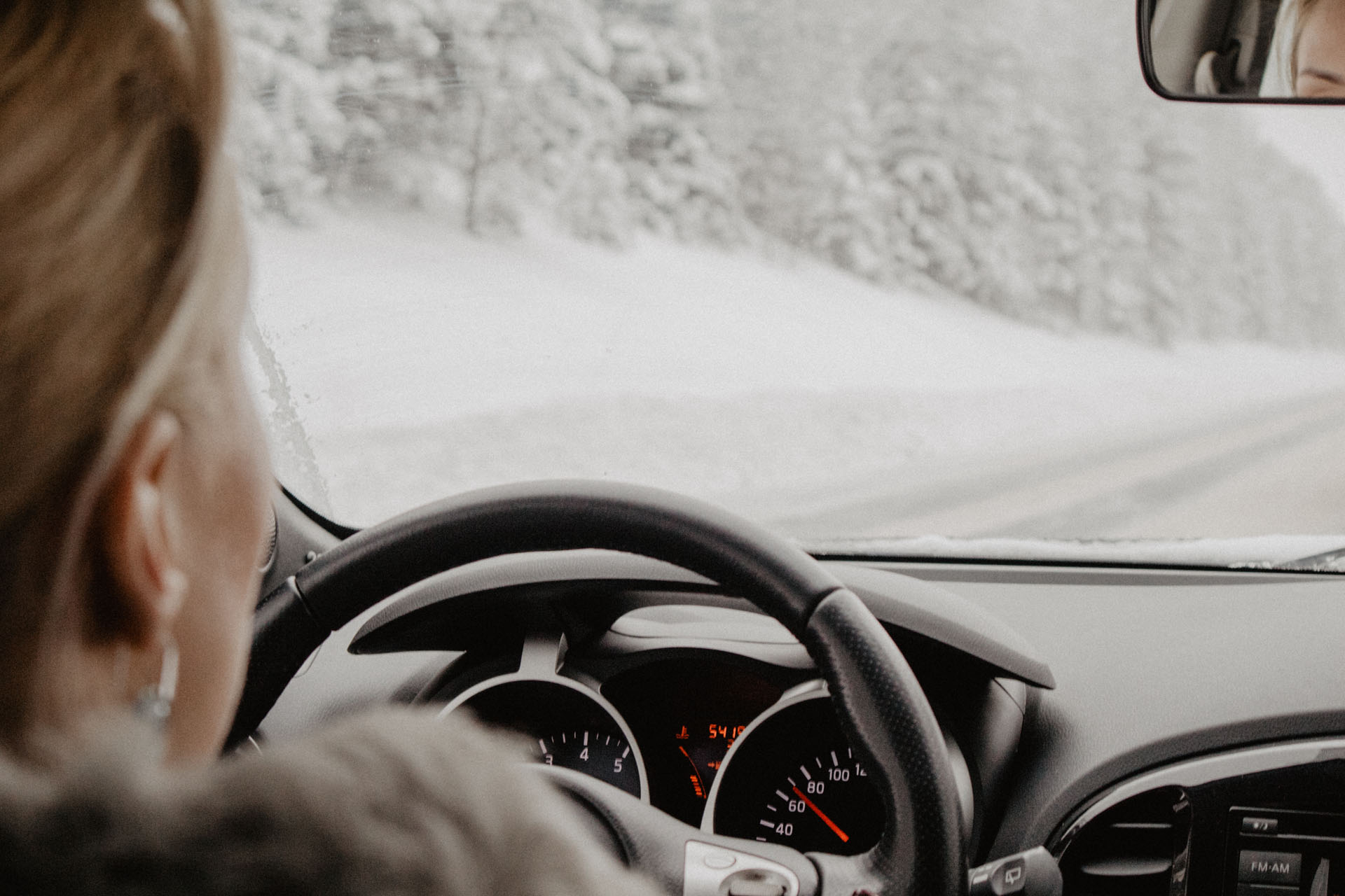 A woman driving in winter