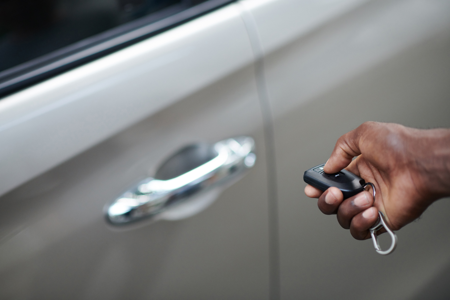 A driver opening their car door