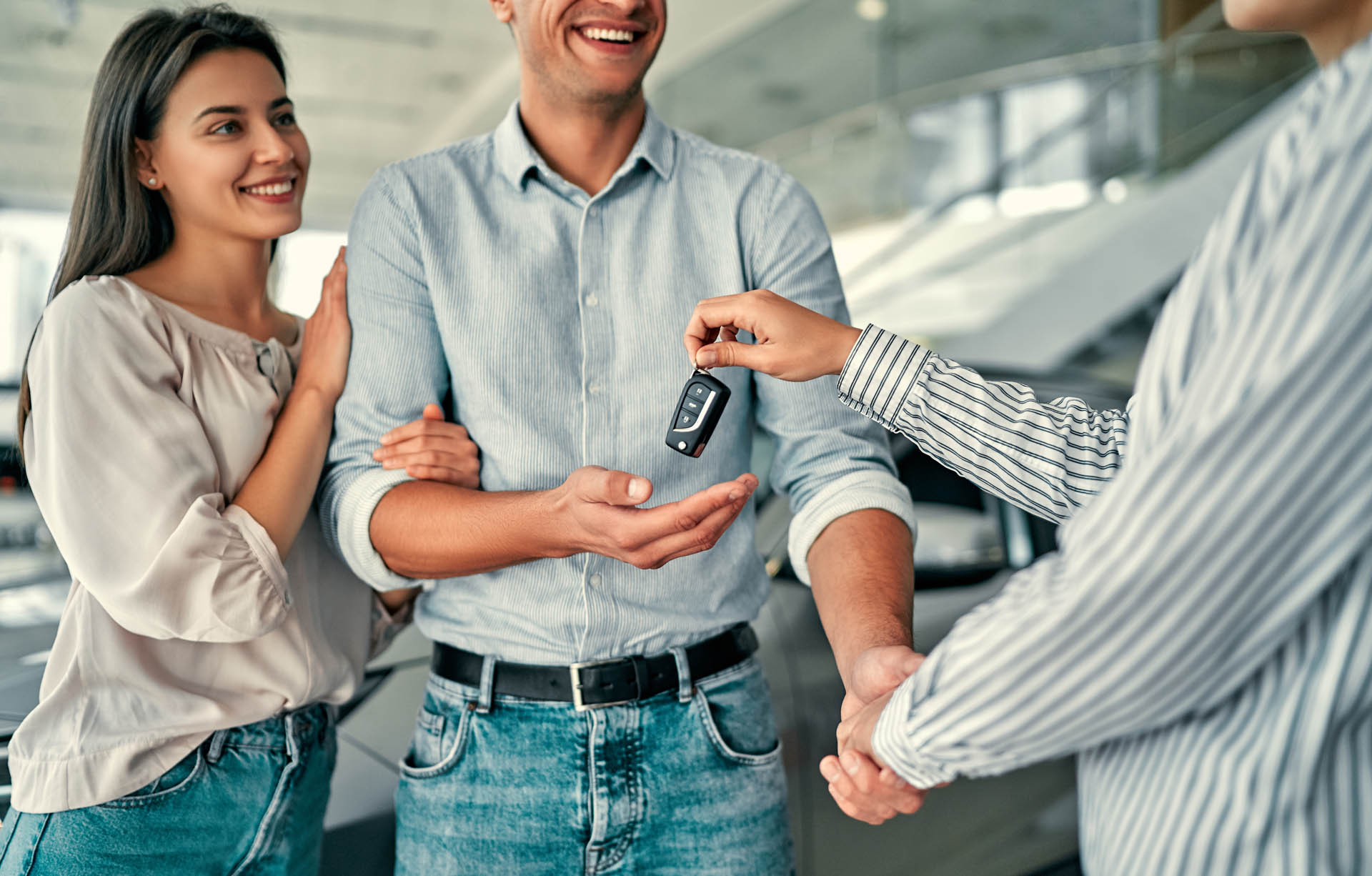 A couple buying a used car